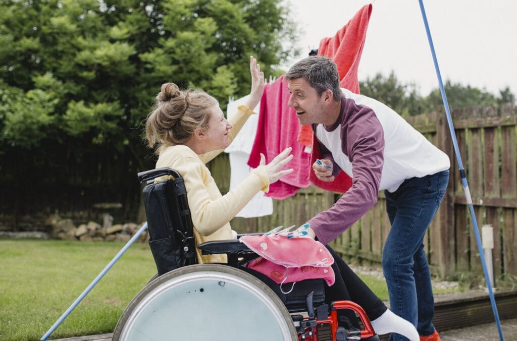 carer taking in the washing